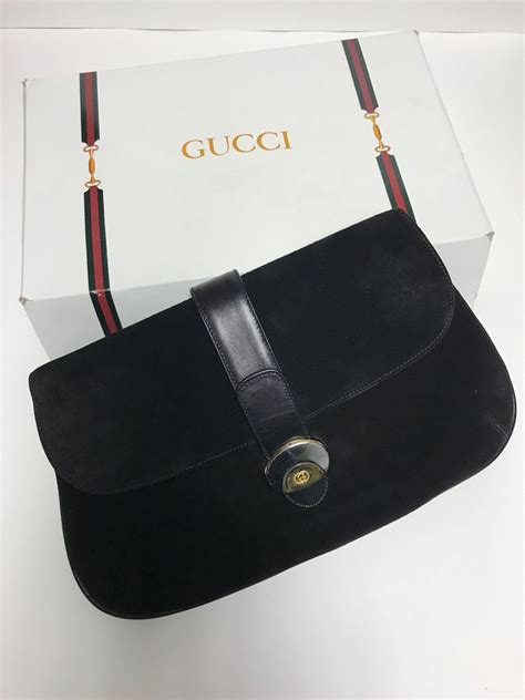 vintage gucci black leather lappius lock clutch|Vintage Gucci Clutch .